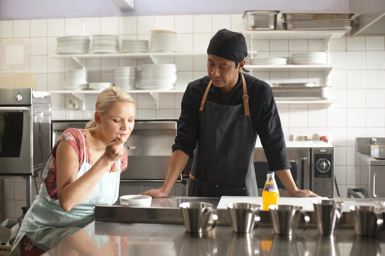 Asiatische Kochkunst, die aus Fremden Freunde macht